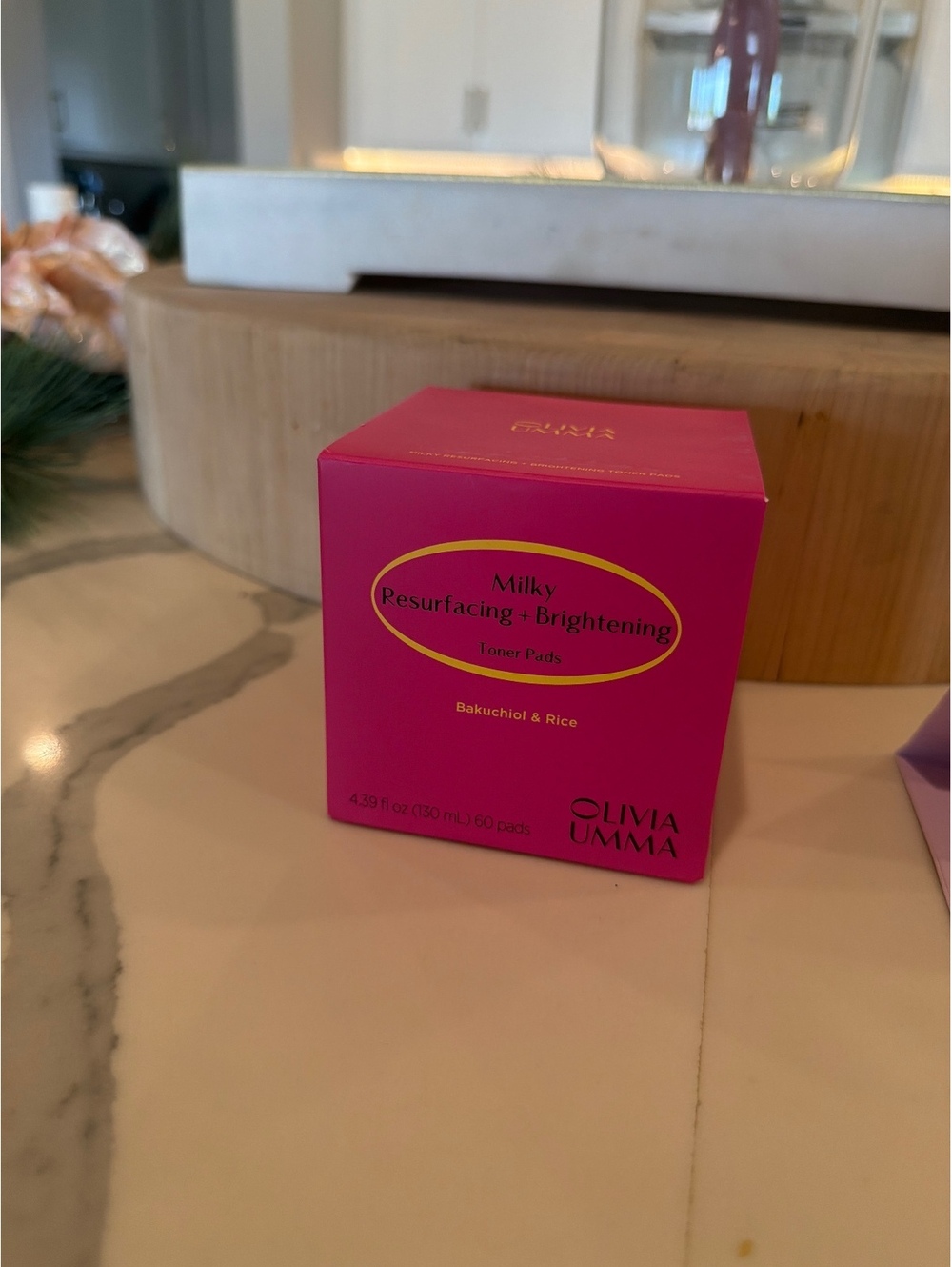 Olivia Umma Milky Resurfacing + Brightening Toner Pads and Face Treatment $48